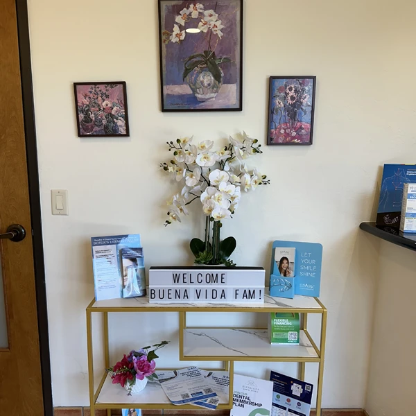 A welcome sign and promotional materials at the front of the clinic